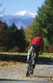 young man riding a bike in Denver