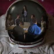 Relection in astronaut's helmet