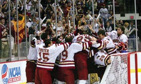 Pioneer hockey team celebrates on the ice