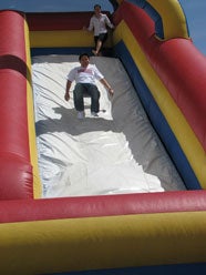 student on giant slide