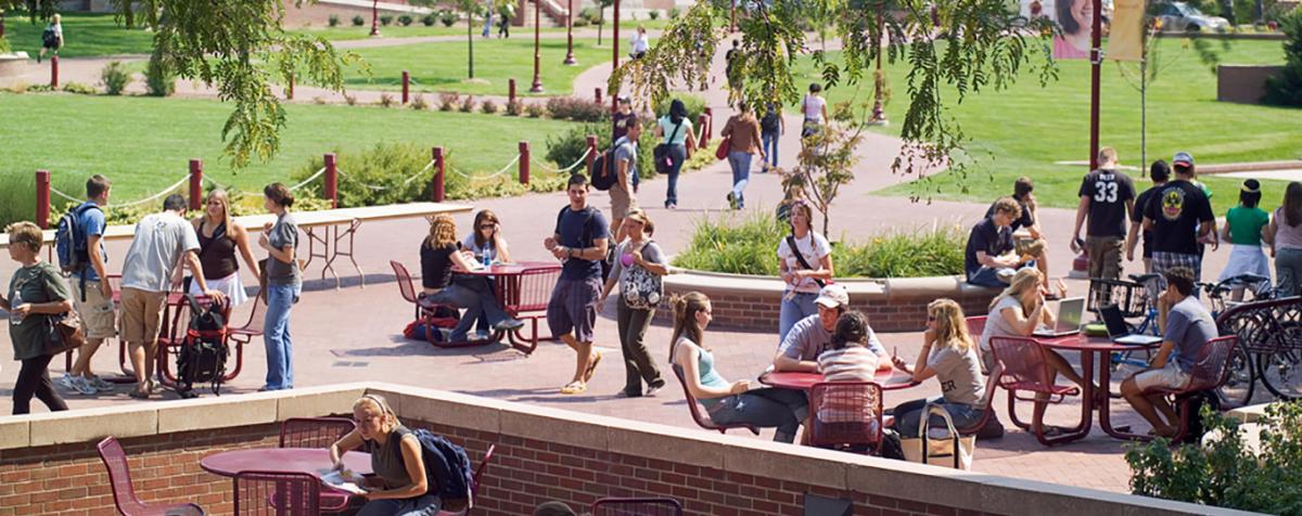 Students sitting on the patio