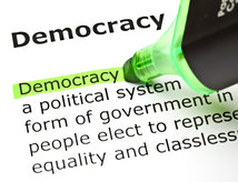 Green highlighting of the word democracy