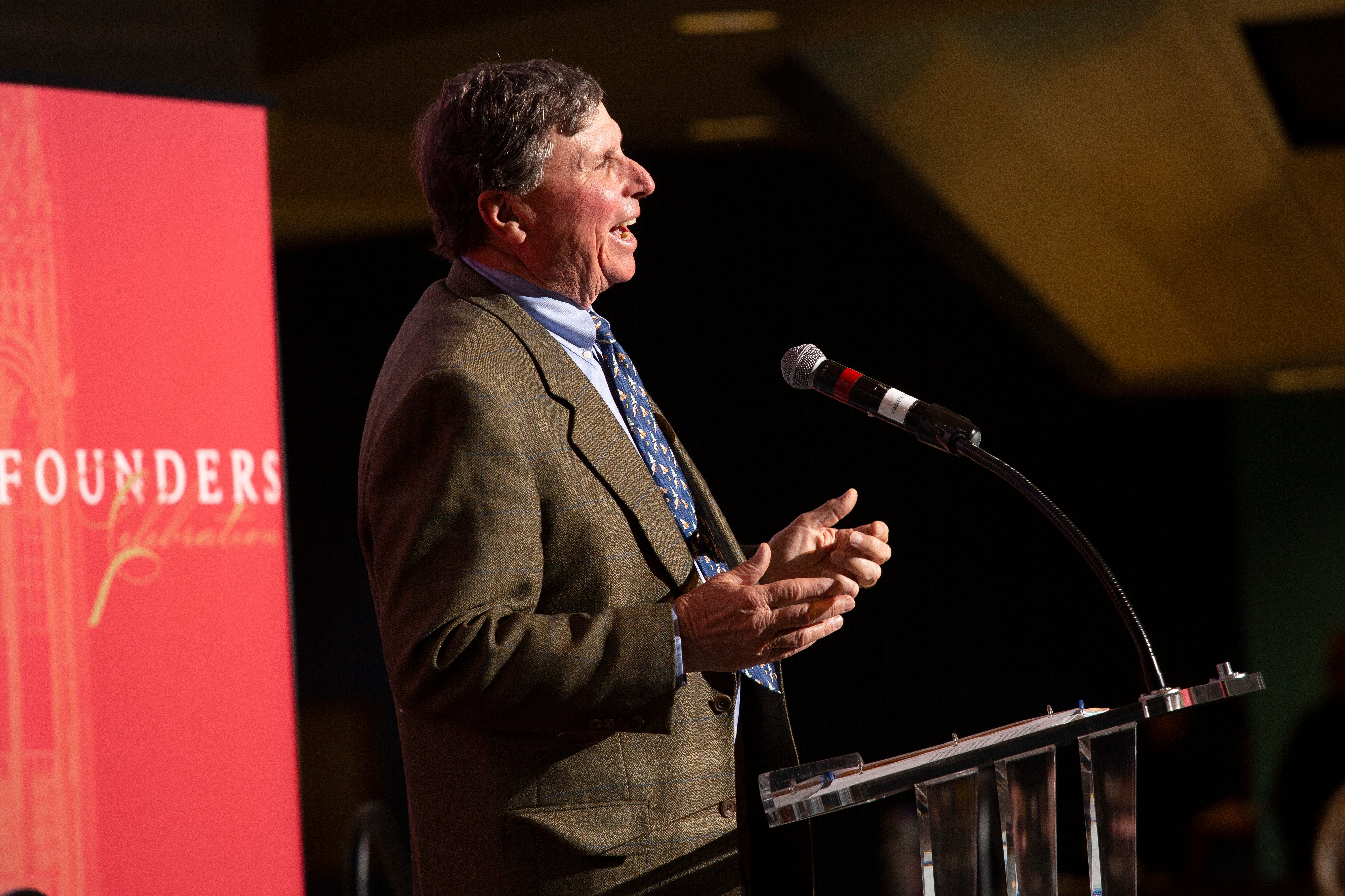 james kennedy speaking at podium