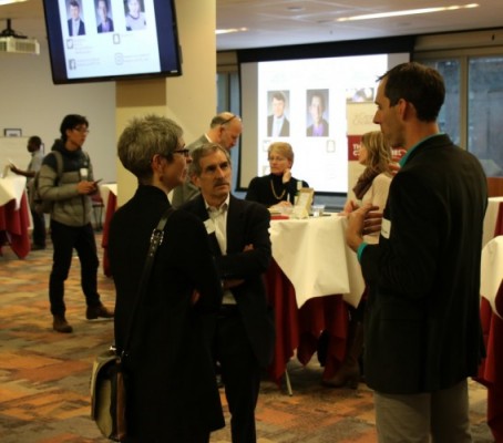 Assistant Prof. Alex Huffman engages with members of the DU community following his presentation at the Grand Challenges Forum.