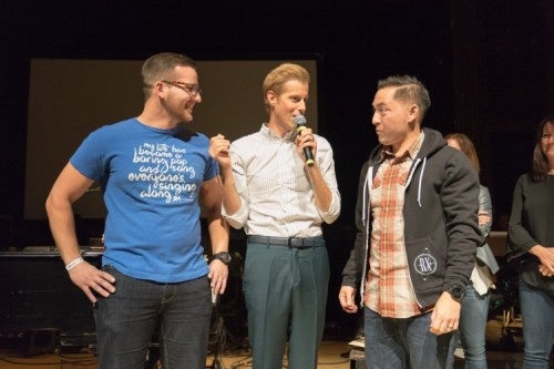 Andrew McMahon (center) bring Doug Booth (left) and Chris Wilkinson (right) together during an event in Denver on Dec. 11.