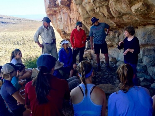 Students learn about indigenous history and rock art from South African archaeologist Janette Deacon during an winter interterm course. (Photo: Mike Kerwin)