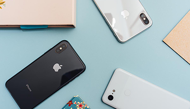 cell phones arranged on a table