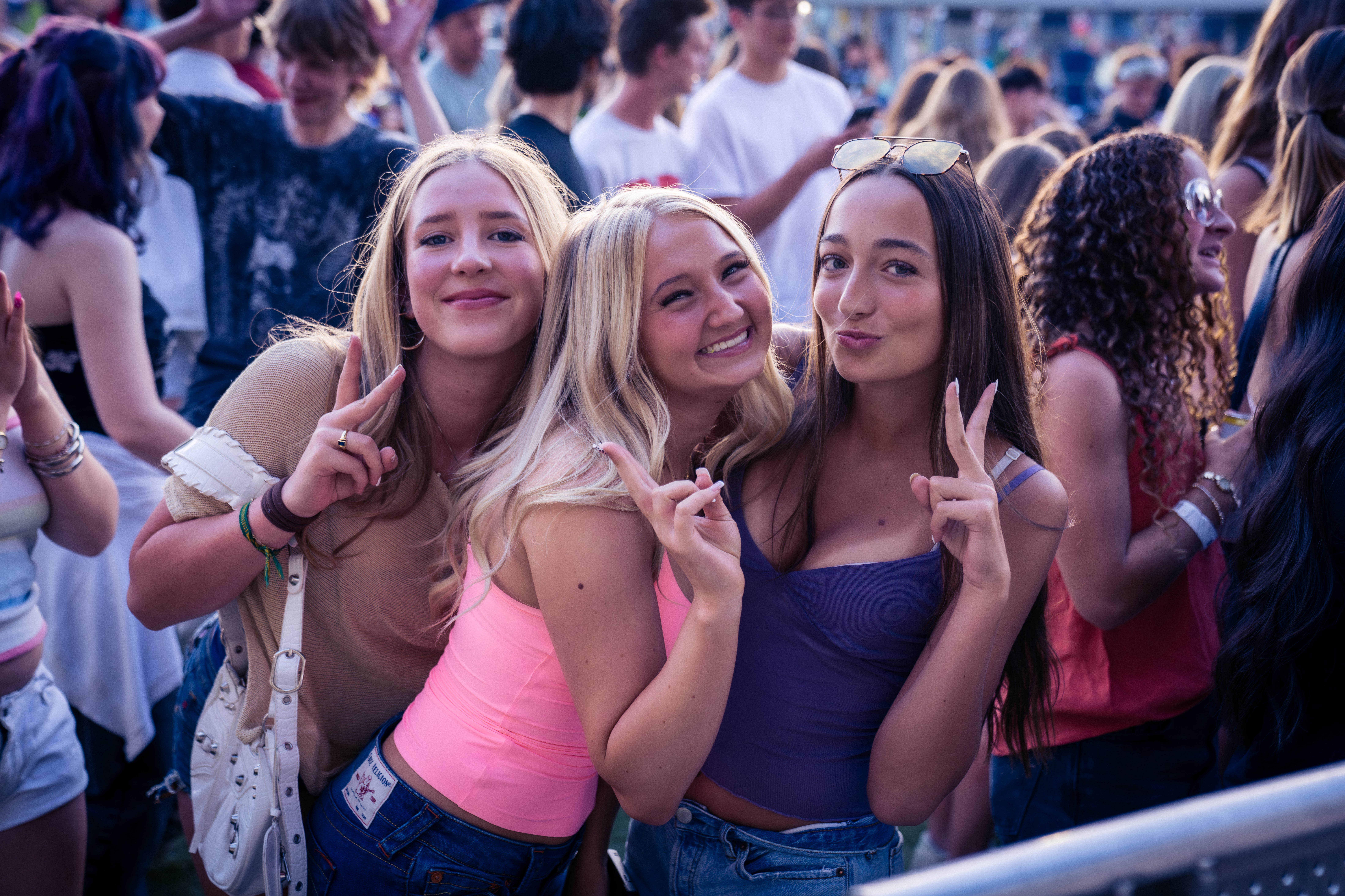 people smiling at a concert