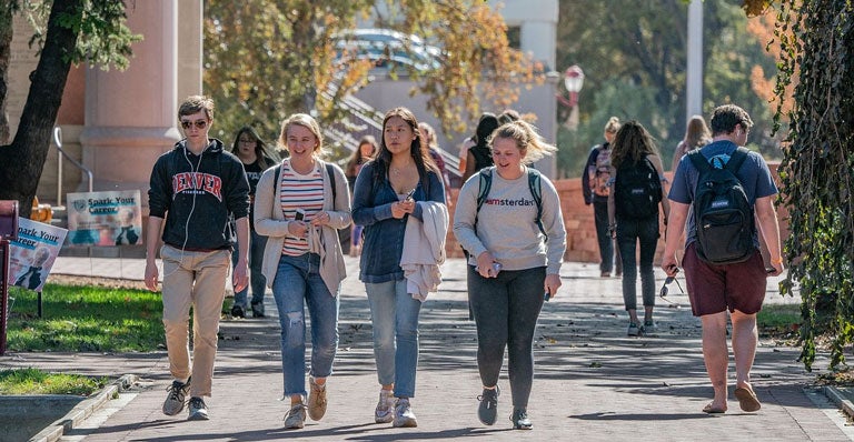 students walking on campus