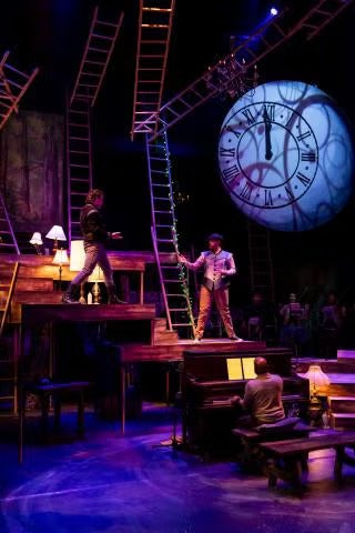 two actors performing on the Into the Woods stage