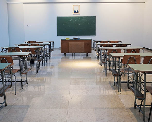 empty classroom with desks
