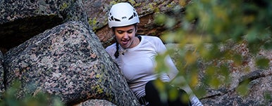 student climbing
