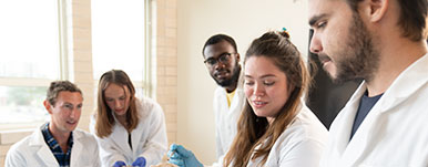 group of students in lab coats