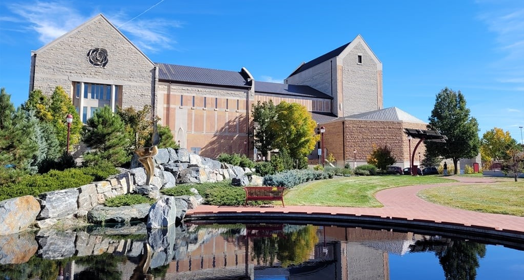Newman Center with pond in front