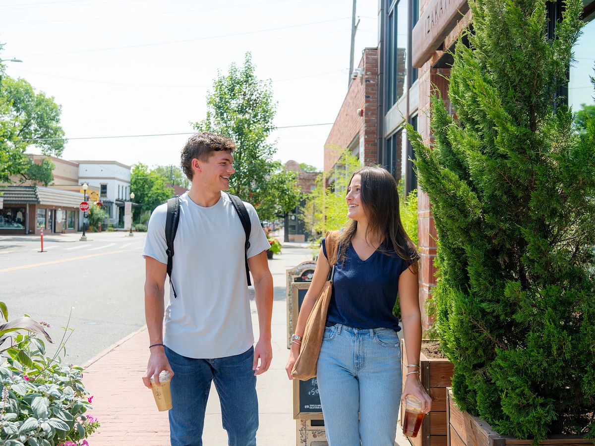 Ben and Merson walking down the street
