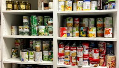 cans of food on a shelf
