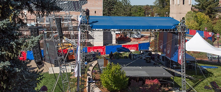 workers building a stage