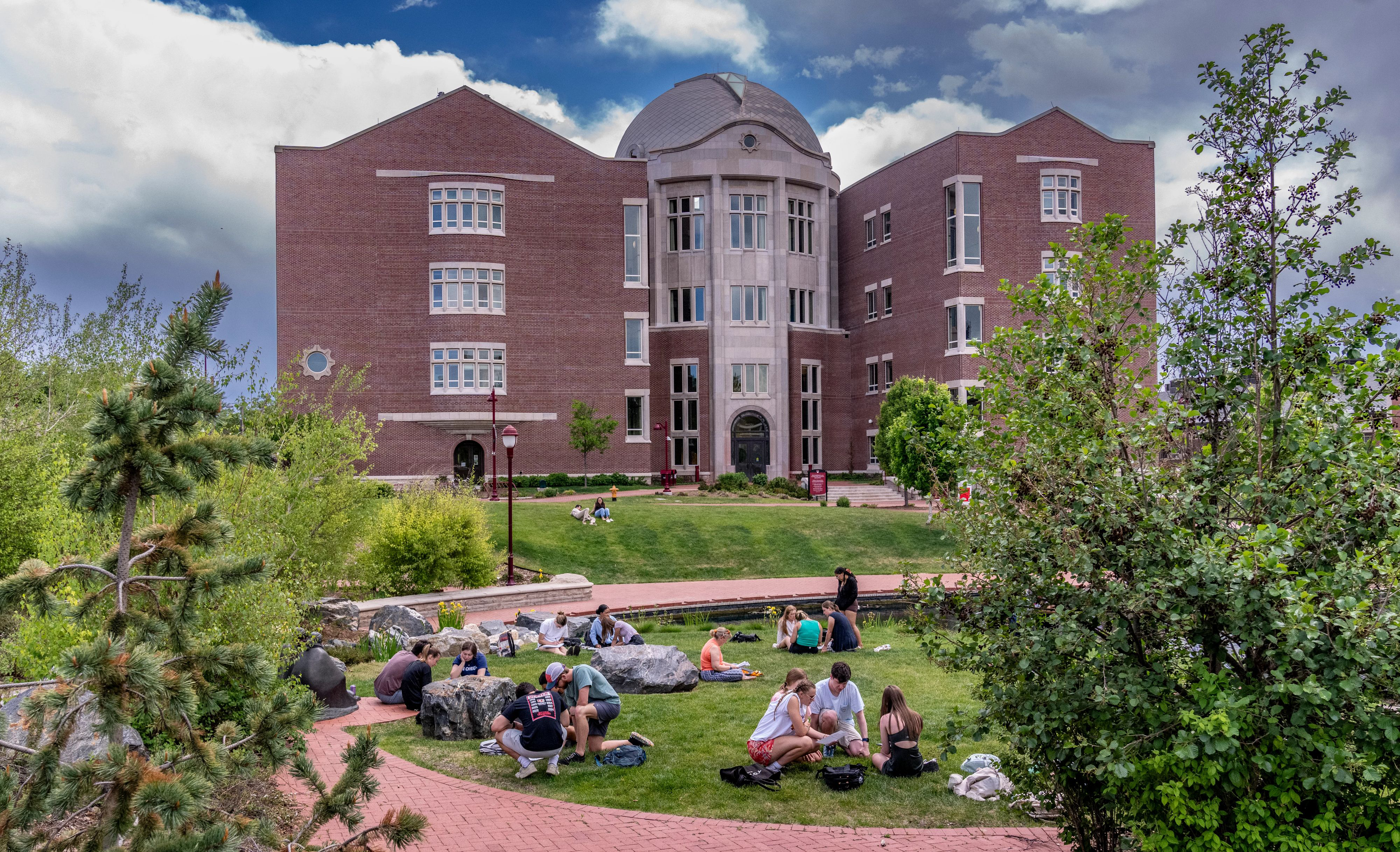 students on lawn near Ritchie College