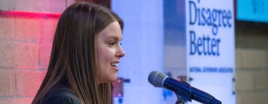 a student speaking on the stage