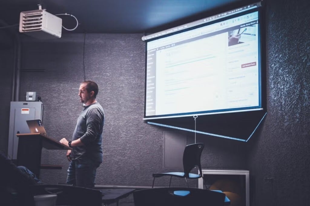 a person giving lecture