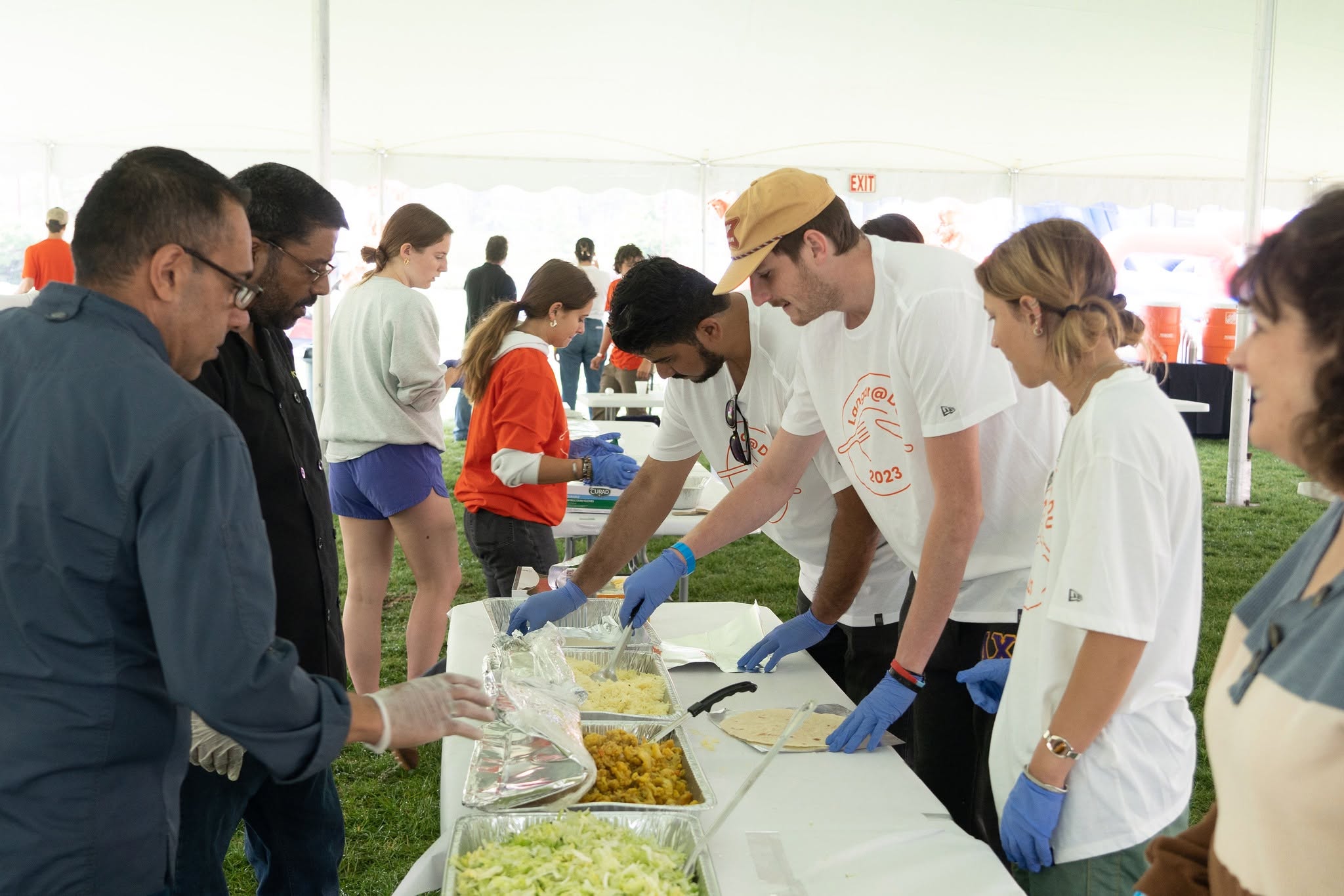 students serving food at langar