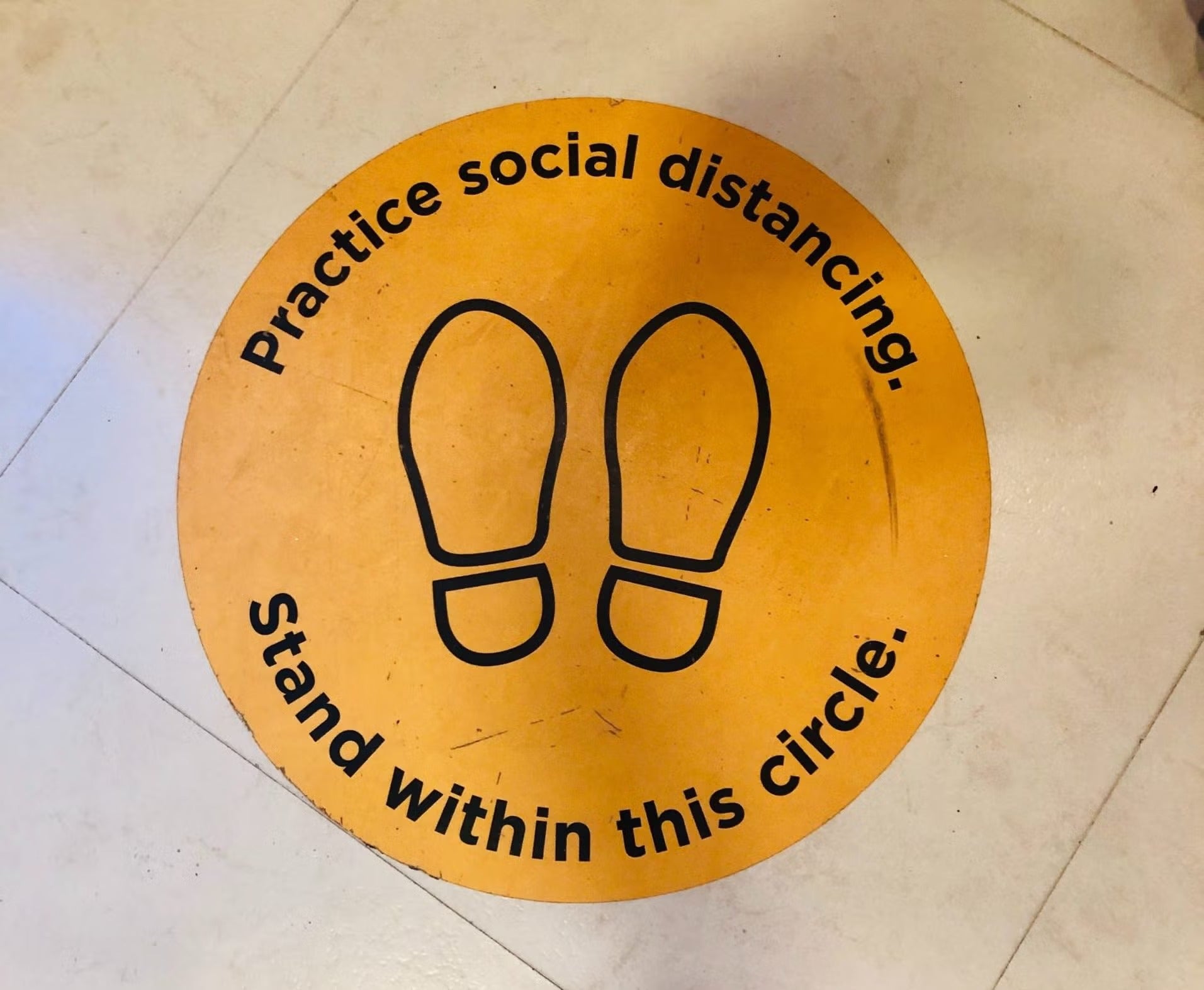 icon: practice social distancing. stand within this circle