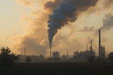 factories billowing smoke into the air