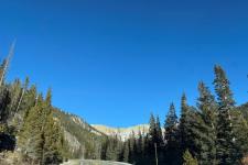 picture of a road in the mountains on a sunny clear day