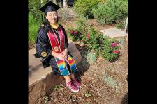 Arely Garcia in a cap and gown