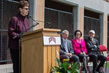 Diane Wendt speaking at a podium