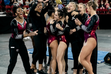 gymnastics-team-celebrating
