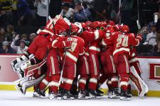 DU hockey celebrates its semifinal victory against Boston University.