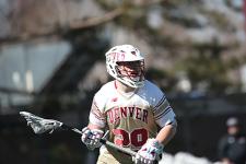 Jackson Harvey playing lacrosse