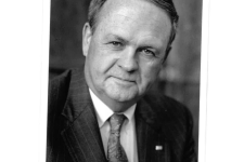 A black and white headshot of Chancellor Emeritus Dwight Smith