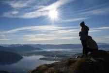 student looking over cliff