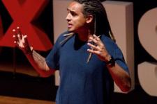 Travis Heath delivering a TED Talk
