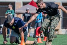 Two people compete in the hero games