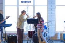 Students perform on stage at DU's annual "Battle of the Bands" competition.