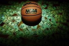 basketball sitting on money