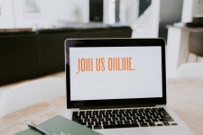 a laptop screen that says 'join us online'