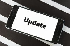 a phone that says 'update' on the screen