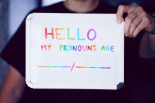 sign that says hello my pronouns are