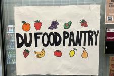 Photo of colorful handmade sign that reads "DU Food Pantry."