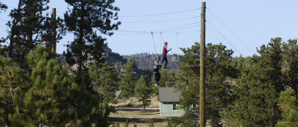 two people on ropes course