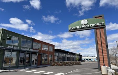 Students from the Fritz Knoebel School of Hospitality Management volunteer at the women's bean project