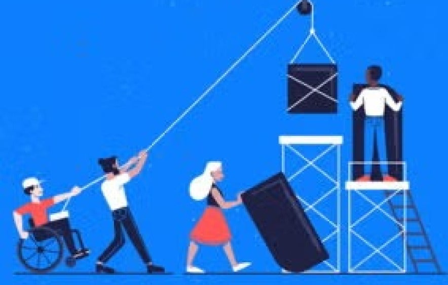 four people building things together