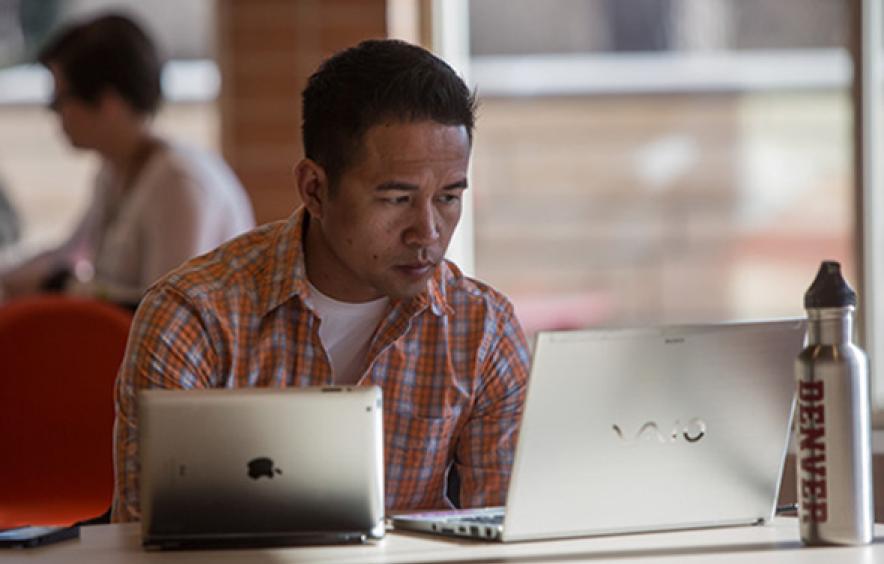 student working on laptop
