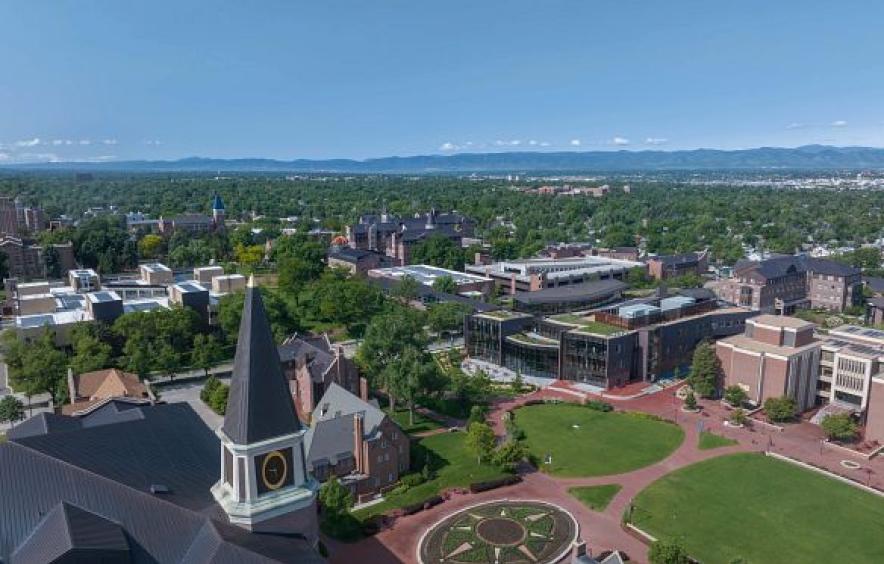 aerial view of campus with foothills in background