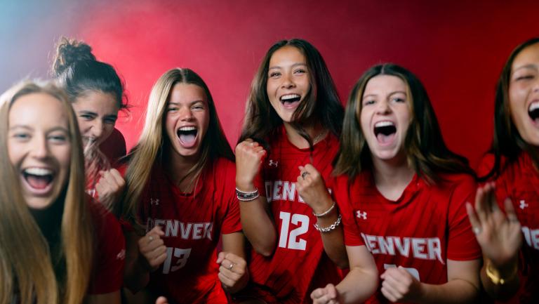 women soccer team cheering