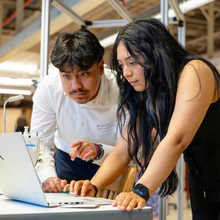 Students working at a computer